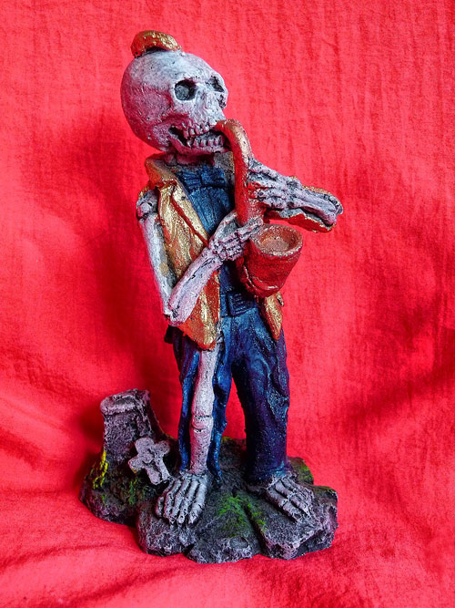 skeleton saxophone player, aquarium figurine, flexibility in teaching styles, adapting your teaching style to your student